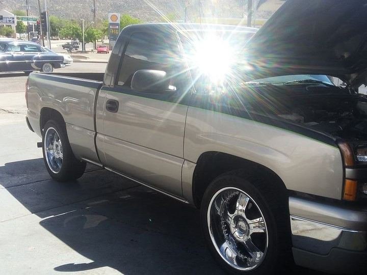 Classic pickup truck fitted with chrome wheels