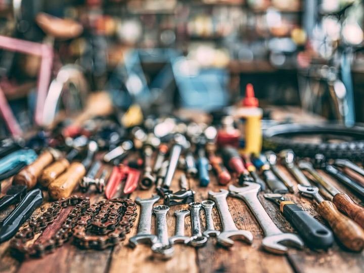 Hand tools laid out on a workbench