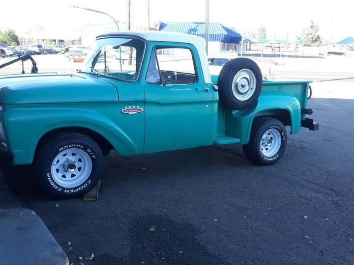 Restored classic pickup truck in turquoise